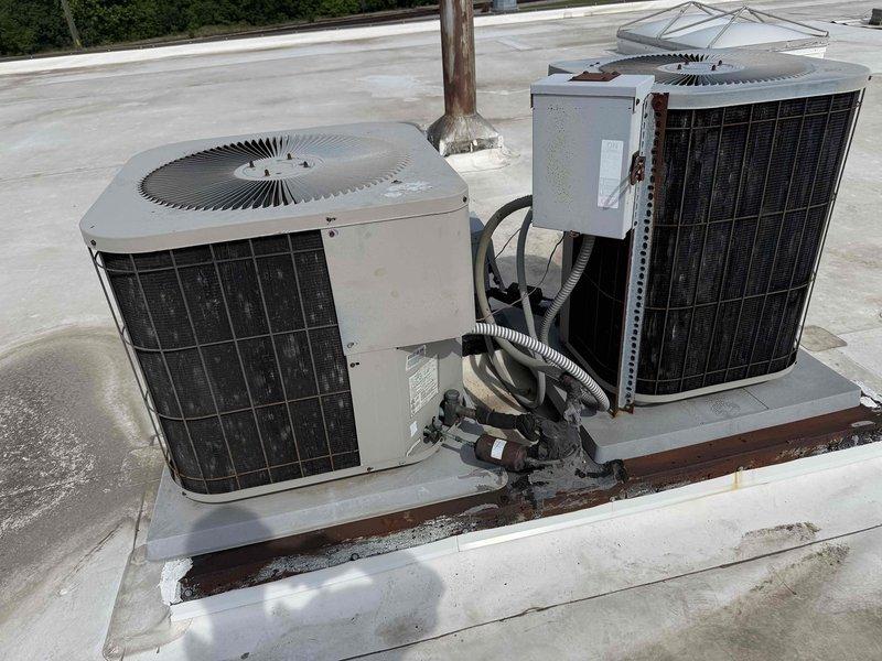 Responded to service call for non-operational rooftop AC unit at commercial facility that had been vacant during fall heating season. Upon arrival, performed comprehensive inspection of dual packaged rooftop units including visual assessment of external components, electrical connections, and mechanical systems. Accessed internal compartments to examine wiring, control boards, and safety devices. Verified unit operation and functionality to ensure proper cooling capacity for newly occupied space.