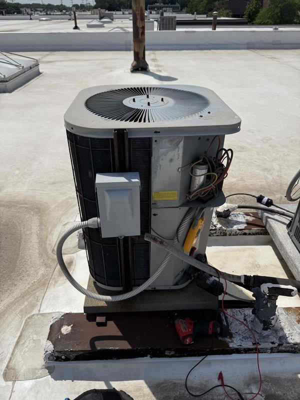 Responded to report of non-operational air conditioning system at commercial property with new tenants. Upon arrival, accessed rooftop unit RTU ID 102-807 and performed comprehensive system inspection. Verified electrical components including capacitor, contactor, and associated wiring connections. Conducted operational testing to assess system functionality following building vacancy period. Unit evaluated and confirmed ready for cooling season operation.