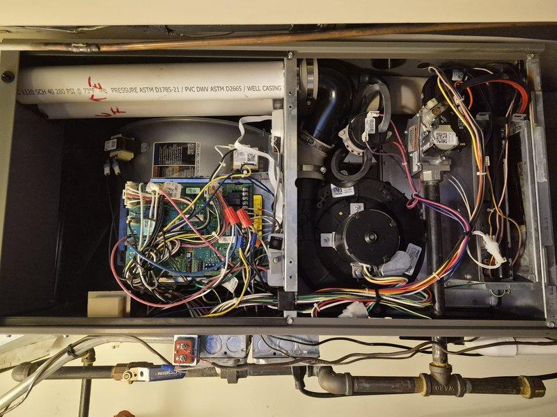 Completed spring preventive maintenance clean and check on air conditioning system per comfort plan agreement. Performed comprehensive inspection of all system components including blower assembly, electrical controls, circuit board connections, and evaporator coil. Cleaned coil fins, verified proper operation of all safety controls and gas valve assembly, checked refrigerant pressures, and confirmed system is operating within manufacturer specifications.