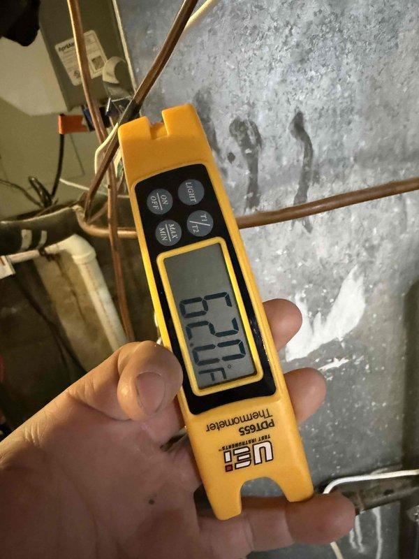Completed comprehensive Comfort Plan maintenance on three HVAC systems including central air conditioning unit, electric air cleaner, and mini-split system with additional air handler head. Performed standard clean and check procedures on all equipment per manufacturer specifications. Verified refrigerant temperatures at 170°F on heating components, inspected copper line sets for proper insulation and connections, and confirmed all systems operating within normal parameters. Documented equipment conditions with photographic records showing proper temperature readings and line set installations.