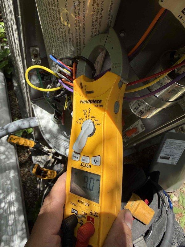 Responded to no cooling complaint with reported strange noise and water leakage. Found severely restricted airflow due to extremely dirty air filter causing evaporator coil to freeze and resulting in active condensate overflow. Documented condition of outdoor condenser coil showing significant dirt accumulation on fin surfaces. Performed electrical diagnostics on blower motor and system components using digital multimeter to verify proper operation. System required filter replacement and coil thawing before normal operation could resume.