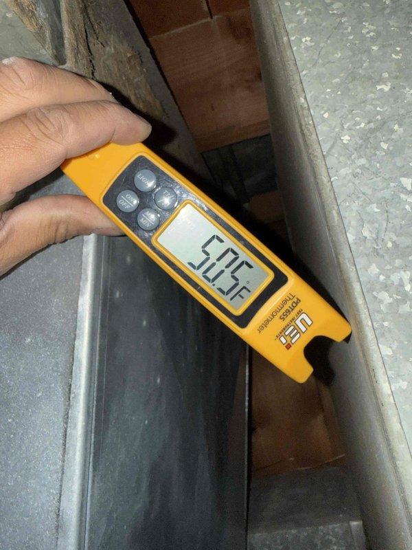 Completed comprehensive comfort plan maintenance on residential air conditioning system located in basement. Performed standard clean and check procedures including temperature differential measurements across supply and return air streams. Supply air temperature recorded at 57.5°F and return air temperature measured at 68.9°F, indicating proper system operation with approximately 11.4°F temperature split. Inspected ductwork and HVAC components, verified proper airflow, and confirmed system is operating within normal parameters for cooling season.