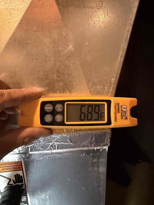 Completed comprehensive comfort plan maintenance on residential air conditioning system located in basement. Performed standard clean and check procedures including temperature differential measurements across supply and return air streams. Supply air temperature recorded at 57.5°F and return air temperature measured at 68.9°F, indicating proper system operation with approximately 11.4°F temperature split. Inspected ductwork and HVAC components, verified proper airflow, and confirmed system is operating within normal parameters for cooling season.