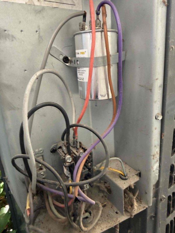 Responded to no cooling complaint on residential air conditioning system. Upon arrival, verified unit was running but not cooling effectively. Performed diagnostic evaluation of outdoor condensing unit including electrical component inspection. Used clamp meter to measure amperage draw, recording 39.1 amps at compressor circuit. Inspected capacitor, contactor assembly, and associated wiring connections for proper operation and signs of failure. All electrical connections were evaluated for integrity and proper voltage supply to ensure system functionality.