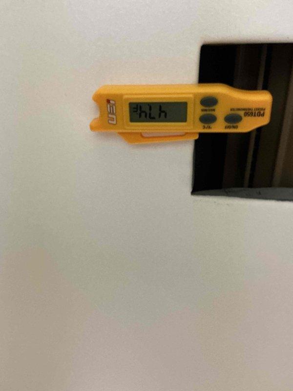 Responded to no cooling call on 28-year-old Trane system utilizing R22 refrigerant. Verified supply air temperature of 96.4°F at register, confirming lack of cooling. Diagnosed low refrigerant charge and added R22 to restore proper system operation and cooling capacity.