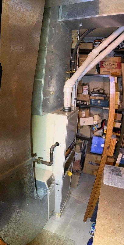 Responded to no cooling call on 28-year-old Trane system utilizing R22 refrigerant. Verified supply air temperature of 96.4°F at register, confirming lack of cooling. Diagnosed low refrigerant charge and added R22 to restore proper system operation and cooling capacity.