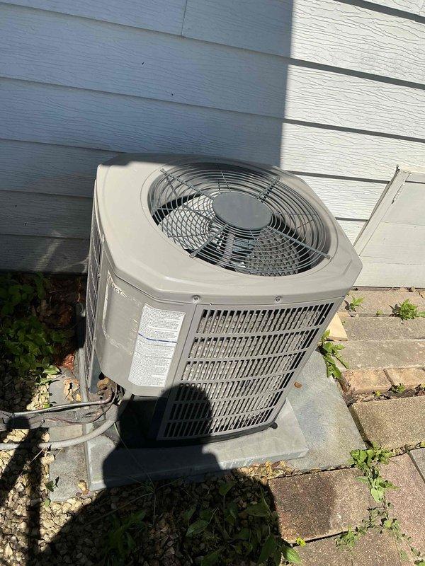 Completed spring maintenance clean and check on residential air conditioning system per comfort plan agreement. Performed comprehensive inspection of outdoor condenser unit, verified proper electrical operation with amp draw readings of 1.007A and 37.94A at compressor, cleaned condenser coil and housing, checked refrigerant levels, and confirmed unit operational parameters within manufacturer specifications.