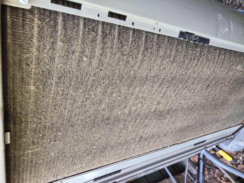 Completed spring preventive maintenance on residential air conditioning system per comfort plan protocol. Serviced outdoor condenser unit, including coil cleaning and operational testing, and replaced heavily contaminated return air filter that showed excessive dust and debris accumulation affecting system airflow and efficiency. All components inspected and system operating within normal parameters upon completion.