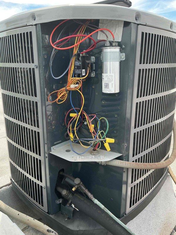 Completed comprehensive tune-up maintenance on single-system HVAC unit including air handler and outdoor condensing unit. Performed standard diagnostic measurements, inspected electrical components including capacitor and contactor, verified system operation, and documented equipment condition with thermal readings showing -56.1°F at evaporator coil. All components found operating within normal parameters; system cleared for continued service.