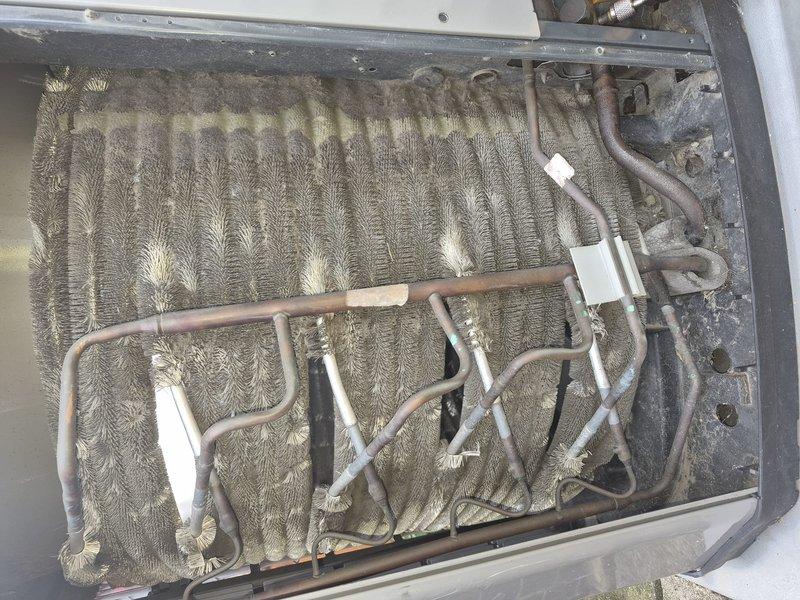 # HVAC Maintenance Summary

Completed spring preventive maintenance clean and check on residential air conditioning system per comfort plan agreement. Evaporator coil exhibited extensive dust and debris accumulation requiring thorough cleaning to restore proper airflow and heat transfer efficiency. Cleaned evaporator coil assembly, removing heavy buildup from aluminum fins and surrounding components. Inspected refrigerant lines, electrical connections, and capacitor. Verified system operation and documented pre-service conditions showing significant need for maintenance intervention.

# Detailed Service Description

Performed comprehensive spring clean and check maintenance on single-system residential air conditioning unit in accordance with comfort plan specifications. Upon initial inspection, discovered evaporator coil assembly with severe dust and debris accumulation throughout aluminum fin surfaces, indicating extended period without professional maintenance.

Removed access panel