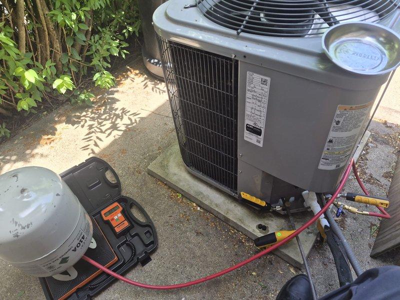 Responded to no cooling complaint on residential air conditioning system. Performed refrigerant recharge using manifold gauge set to restore proper system pressures and cooling capacity. Service completed under warranty at no charge to customer.