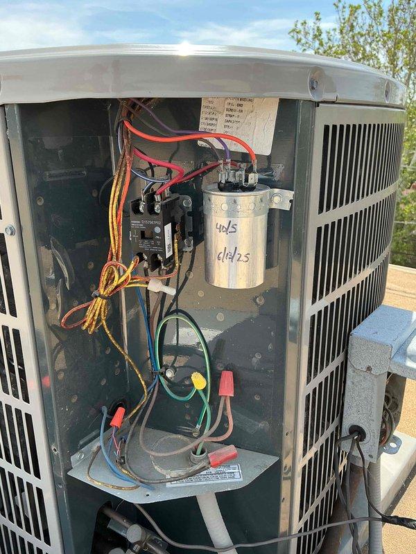 Performed comprehensive clean and check maintenance on single HVAC system per comfort plan agreement. Inspected outdoor condensing unit, verifying proper operation of compressor, condenser coil, and electrical components including capacitor and contactor. All connections found secure with appropriate wire terminations in place. Evaporator coil examined and found in acceptable condition with insulation intact. System operating within normal parameters upon completion of maintenance service.