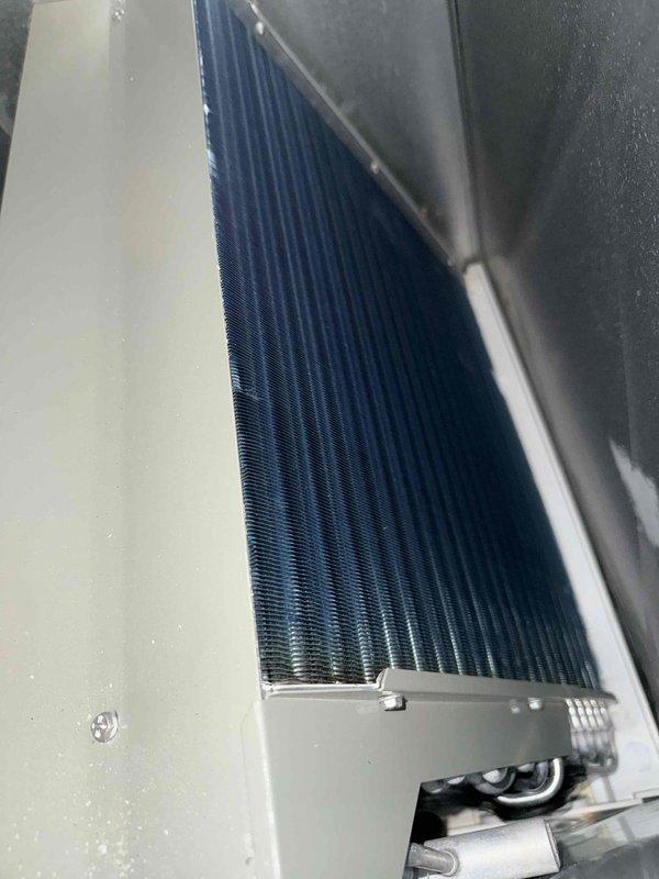 Completed spring clean and check maintenance on residential cooling system in tight utility closet space. Performed comprehensive inspection of air handler unit, evaporator coil, and refrigerant lines, with special attention to heat exchanger condition following previously identified fall concerns. Evaporator coil found clean with straight, intact fins and no debris accumulation. Verified proper refrigerant line connections, insulation integrity, and ball valve operation. All system components operating within normal parameters with no issues found during inspection.