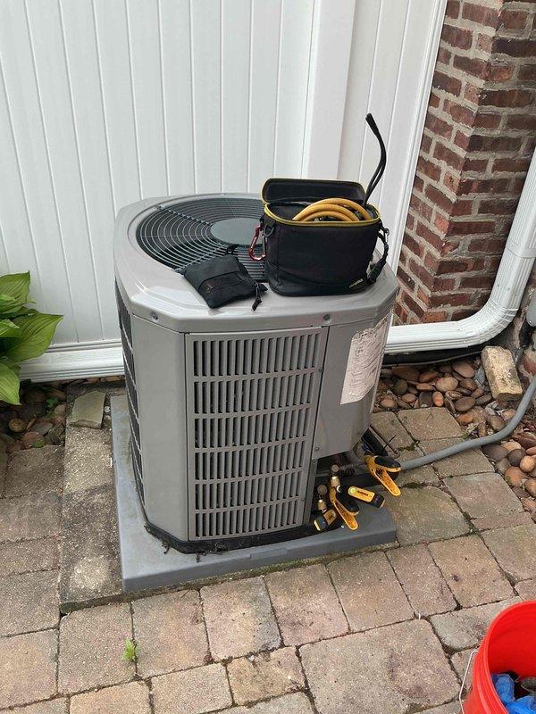 Completed comprehensive air conditioning clean and check maintenance per Goodman Comfort Plan agreement. Performed full system inspection of outdoor condensing unit, replaced indoor air filter with new ACE brand filter, checked refrigerant pressures and electrical connections, and verified proper operation of all components.