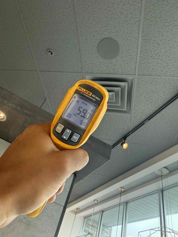 Responded to callback for rooftop unit experiencing loud noise that persisted after previous service visit in May. Performed diagnostic inspection of compressor and refrigerant system, utilizing manifold gauges to check system pressures and infrared thermometer to measure supply air temperature at ceiling diffuser. Collected labor time for warranty evaluation and further diagnosis of recurring noise issue.