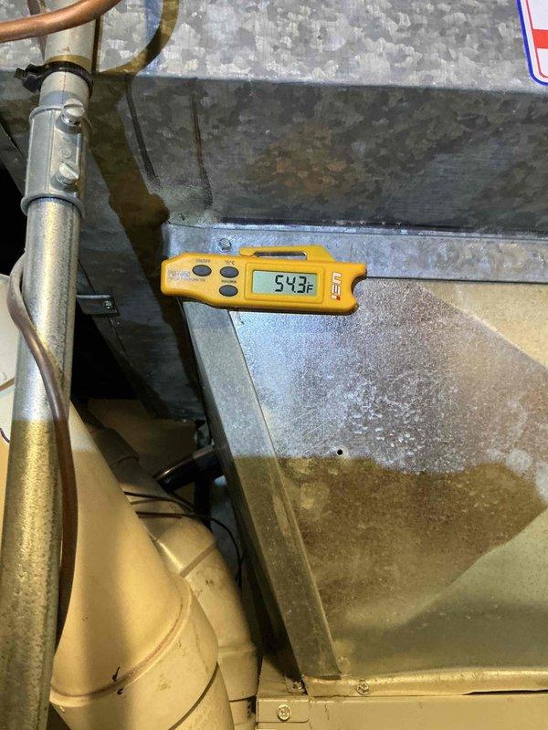 Completed comprehensive clean and check maintenance on two-system HVAC installation per comfort plan agreement. Performed temperature diagnostics on air handler unit, recording supply air temperature of 54.3°F to verify proper cooling performance and system operation. Inspected indoor equipment including furnace/air handler installation, condensate drain lines, electrical connections, and overall system condition with both units operating within normal parameters.