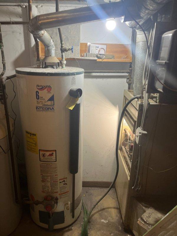 Conducted on-site evaluation of a non-functional 20-year-old HVAC system original to the home. Assessed both indoor furnace unit located in basement mechanical room and outdoor air conditioning condenser, which exhibited severe rust, corrosion, and deterioration throughout metal casing and components. Documented equipment condition, reviewed system specifications, and provided comprehensive replacement estimate for complete HVAC system upgrade.
