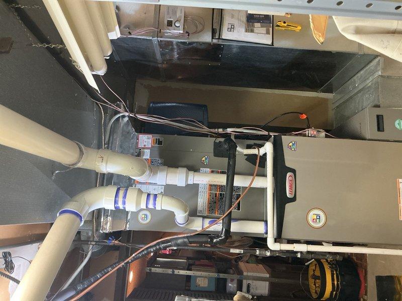 Completed full HVAC system replacement including furnace and air conditioning equipment. Disconnected and properly disposed of existing forced air furnace, then installed new Lennox SLP99UH110XV60CK 110,000 BTU variable speed furnace with connections to existing supply and return ductwork, gas line, electrical circuit, and exhaust system. Reclaimed refrigerant from existing AC system and removed old condenser and evaporator coil. Installed new Lennox EL18KCV-048-230 4-ton 18 SEER2 variable speed condensing unit on leveled pad with pea gravel, along with new evaporator coil matched to system specifications. Connected new AC components to existing copper refrigerant lines, evacuated system to remove moisture and air, then charged with R454B refrigerant to manufacturer specifications. Performed complete startup procedures, tested and adjusted all equipment for optimal performance, and conducted comprehensive safety inspection on both heating and cooling systems. All equipment operating wi