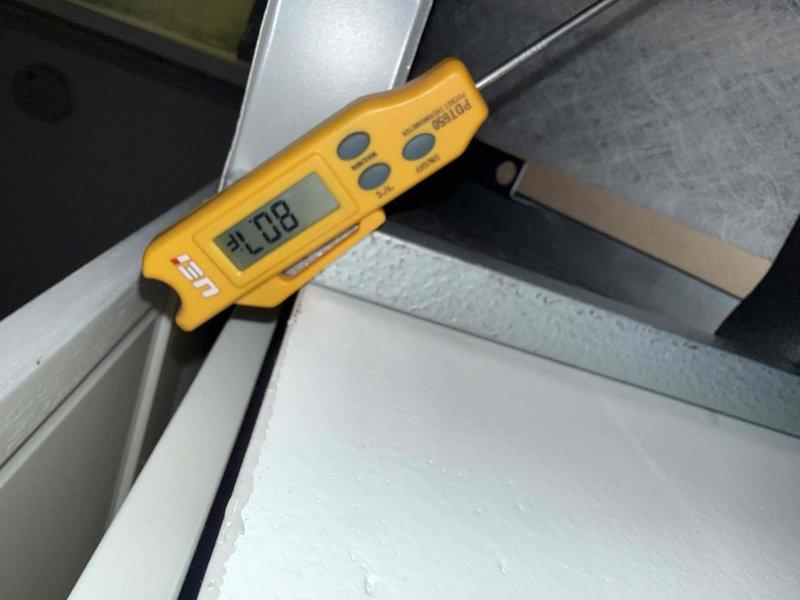 Responded to no cooling complaint on residential air conditioning system. Upon arrival, verified thermostat settings and confirmed system operation. Performed temperature diagnostics using digital thermometer, measuring supply air temperature at ductwork which registered 41°F, indicating adequate cooling performance. Inspected air handling equipment and verified proper airflow through system. Determined unit was operating within normal parameters and cooling effectively. System found to be functioning correctly with no repairs required.