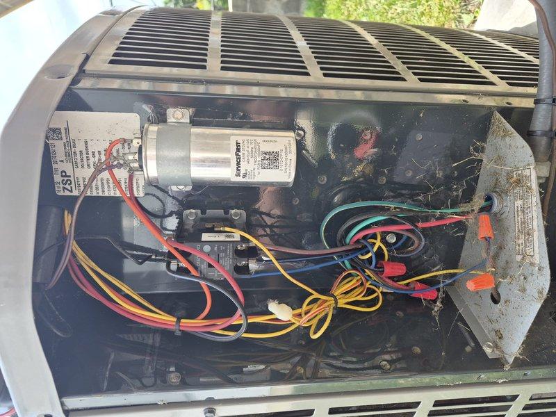 Responded to no cooling complaint on condenser unit model 4A7A3024H1000NA. Upon arrival, confirmed outdoor unit was not operating while indoor blower functioned normally. Inspected condenser and found capacitor failure preventing compressor and condenser fan motor from starting. Tested electrical connections and verified compressor was not locked. Documented system conditions with photos of furnace interior components and outdoor condenser unit showing failed capacitor and wiring connections. Provided diagnostic findings and repair options to restore cooling operation.