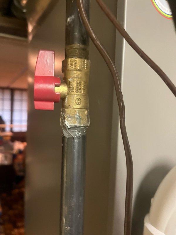 Responded to no-charge return visit for reported gas odor near recently installed furnace. Investigation revealed gas leak at shut-off valve connection point. Immediately shut off gas supply to furnace for safety. Unit secured and customer notified that follow-up visit will be scheduled to repair valve connection and restore safe operation.