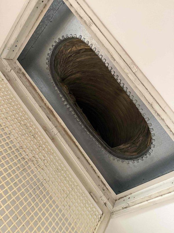 Completed annual Clean and Check maintenance service on single HVAC system per Comfort Plan agreement. Inspected ceiling-mounted air handler unit, including return air grille, filter access, and flexible duct connections. Serviced condensate drainage system components, including PVC drain lines, trap assembly, and emergency float switch with proper operation verification. All system components found operational with no immediate concerns noted.