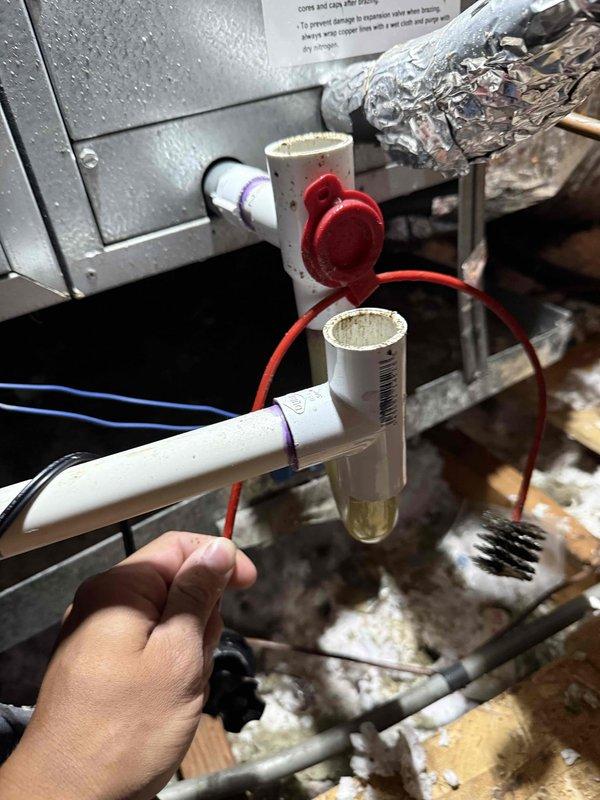 Completed annual Clean and Check maintenance service on single HVAC system per Comfort Plan agreement. Inspected ceiling-mounted air handler unit, including return air grille, filter access, and flexible duct connections. Serviced condensate drainage system components, including PVC drain lines, trap assembly, and emergency float switch with proper operation verification. All system components found operational with no immediate concerns noted.