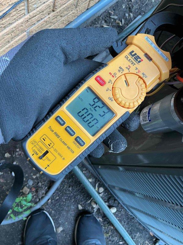 Completed annual air conditioning clean and check maintenance per Comfort Plan agreement. Performed comprehensive system inspection of outdoor condenser unit, verified electrical readings at 253 volts within acceptable range, cleaned condenser coil, and confirmed proper operation of all components.