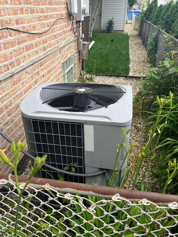 Completed diagnostic evaluation of residential air conditioning system experiencing intermittent operational issues and glitching behavior. Inspected outdoor condenser unit positioned against brick exterior, confirmed unit functionality and assessed overall system condition. Documented existing equipment installation including electrical connections, disconnect box, and proper placement on gravel pad with adequate clearance. Collected membership renewal payment as requested. System evaluated under existing maintenance agreement, no billing generated per customer care protocol.