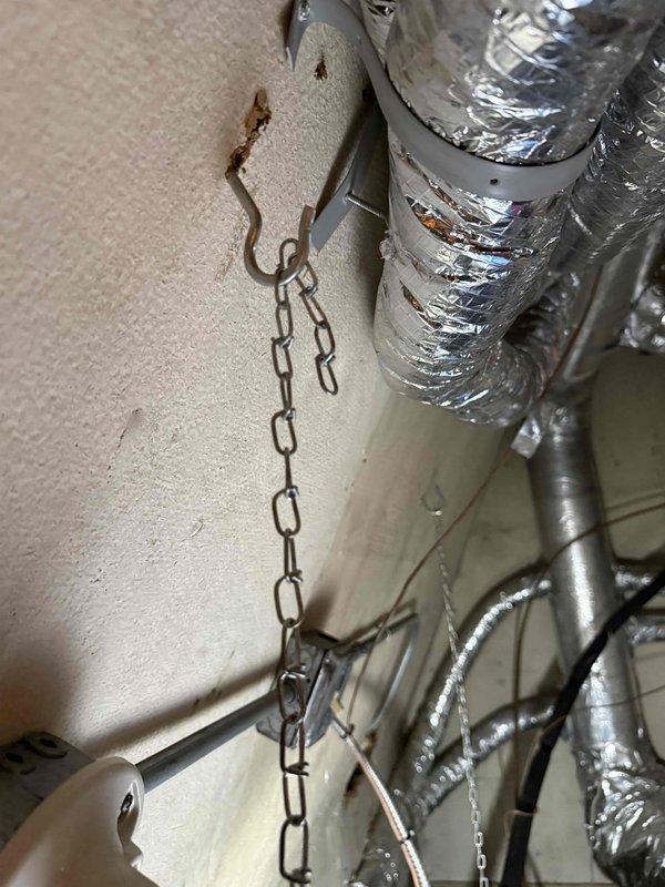 Responded to emergency callback for water pooling under upstairs air handler on 4-year-old system under parts and labor warranty. Upon inspection, discovered condensate drain line was improperly connected, preventing water from being ejected outside as required. Reconnected and secured PVC condensate piping to ensure proper drainage to exterior, verified flow, and confirmed no further pooling at blower unit.