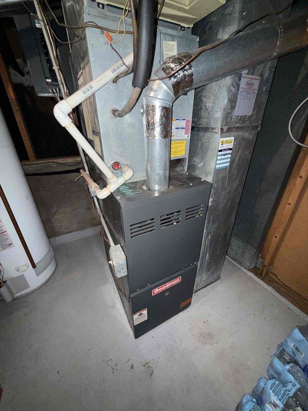 Responded to no cooling complaint with tripped breaker, a recurring issue previously documented. Upon arrival, confirmed AC system was non-operational with breaker tripped at panel. Conducted comprehensive diagnostic of outdoor condensing unit and indoor air handler system. Verified evaporator and condenser coils were clean with no airflow restrictions. Performed electrical diagnostics including amp draw testing on condenser fan motor, contactor voltage verification, and circuit breaker integrity assessment. Measured operating amperage on compressor and fan motor circuits to identify potential electrical fault causing breaker trips. Inspected contactor for pitting, proper voltage pull-in, and contact integrity. Evaluated circuit breaker for signs of degradation or failure that could cause nuisance tripping. Replaced failed dual-run capacitor (45/5 MFD, 370VAC) which tested outside acceptable tolerance range and showed signs of deterioration. Capacitor failure was contributing to elevat