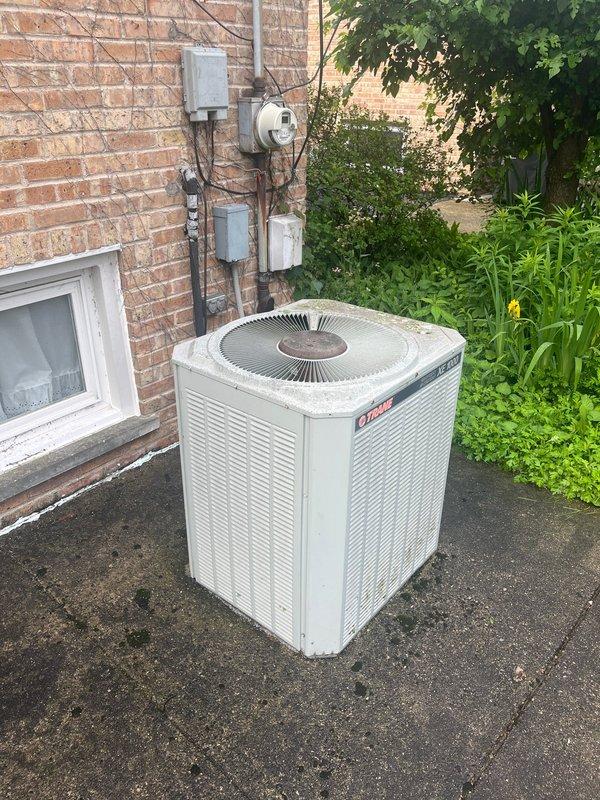 Conducted comprehensive assessment of 20+ year old Bryant air conditioning system for replacement estimate. Evaluated outdoor condensing unit showing significant age-related wear and deterioration, along with indoor furnace and air handler components in basement utility area. Provided detailed replacement options and recommendations for complete HVAC system upgrade due to equipment age exceeding expected service life.