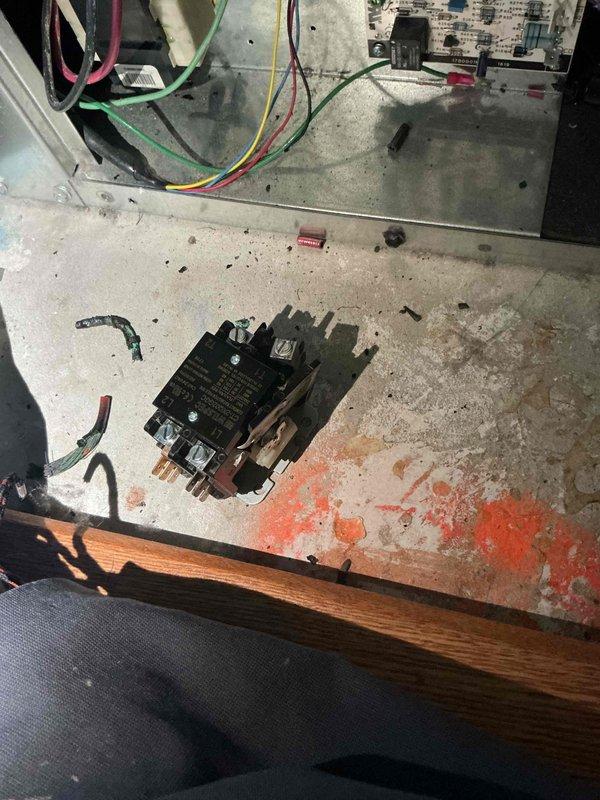 Responded to new customer no cooling complaint on ClimateMaster geothermal air handler system. Upon arrival, confirmed indoor fan operation but no cooling output on first seasonal startup. Performed diagnostic inspection and found failed contactor preventing compressor engagement. Removed defective contactor from unit, which showed signs of electrical wear and corrosion. Replaced contactor, verified proper electrical connections, and tested system operation. Unit restored to full cooling capacity with compressor engaging properly and delivering cold air as designed.