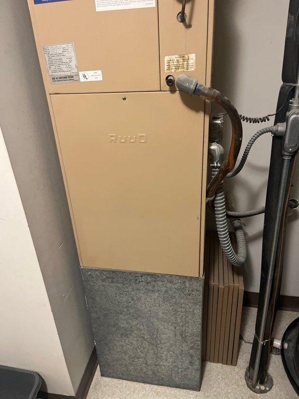 Responded to service call for non-operational cooling system that failed the previous fall on an over 15-year-old RUUD HVAC unit. Performed diagnostic evaluation of existing air handler and condensing unit, assessed system age and condition, and determined equipment had reached end of serviceable life. Provided comprehensive replacement estimate for new heating and cooling system including equipment specifications, installation requirements, and available upgrade options.