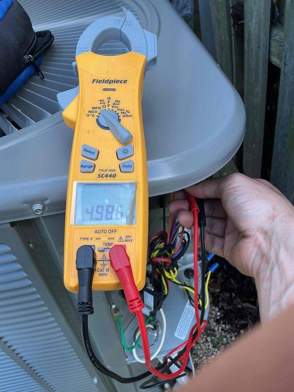 Completed annual air conditioning clean and check maintenance per comfort plan agreement on Lennox system. Performed comprehensive electrical diagnostics using clamp meter to verify proper amperage draw and voltage at outdoor condensing unit, inspected all electrical connections and wiring, confirmed indoor furnace and evaporator coil assembly operation, checked refrigerant lines and condensate drainage system for proper function. All components tested within normal operating parameters and system operating efficiently.