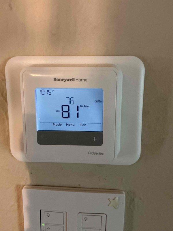 Completed warranty service on residential HVAC system involving multiple component replacements. Replaced failed capacitor in outdoor condenser unit and installed new circuit board in SpacePak air handler system. All replacement parts were obtained under manufacturer warranty coverage. Verified thermostat operation showing proper cooling mode functionality with system cycling correctly between current temperature of 81 degrees and setpoint of 76 degrees. Documented electrical connections and component installations with photos for warranty records.