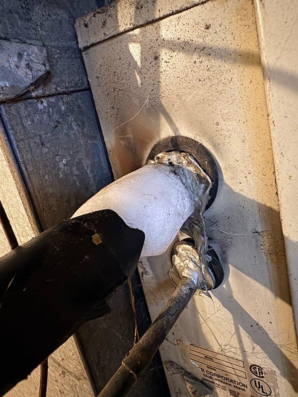 Responded to callback for inadequate cooling with thermostat set to 60°F but indoor temperature remaining at 74°F. Performed system inspection and documented exterior condensing unit installation and refrigerant line penetrations through building envelope. Follow-up assessment conducted to verify system performance and identify recurring cooling deficiency from previous service visit.