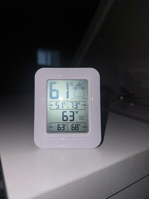 Responded to warranty callback for HVAC system experiencing over-cooling and high indoor humidity levels. Upon arrival, found system operating with thermostat set to 78°F but indoor temperatures reading significantly lower at 60-66°F in various zones, with humidity fluctuating between 53-73%. Investigated thermostat programming and identified dehumidification mode actively engaged, causing system to overcool space in attempt to reduce moisture levels. Adjusted thermostat settings and dehumidification parameters to prevent excessive cooling cycles while maintaining proper humidity control. Verified furnace and air handler operation, inspected condensate drainage system following previous water leak alarm, confirmed drain pan dry and functioning properly. Educated customer on proper thermostat operation and humidity management settings to prevent future over-cooling issues while maintaining comfortable indoor environment.