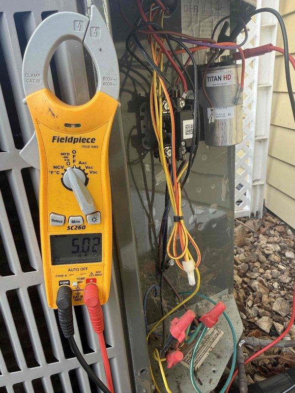 Performed comprehensive clean and check maintenance on air conditioning system and electronic air cleaner per comfort plan agreement. Conducted electrical diagnostics using clamp meter, verified proper amperage draw, inspected and tested capacitor and electrical connections at outdoor unit, and examined blower assembly and filtration components for optimal airflow and system performance.