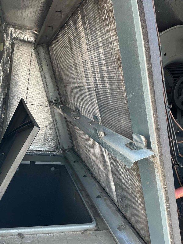 Completed spring maintenance clean and check on rooftop HVAC unit per Comfort Care Plan agreement. Accessed RTU using ladder, removed panels, and inspected evaporator coil and blower assembly. Replaced four 16x25x2 air filters, cleaned accessible components, and verified proper operation of all mechanical systems. Unit returned to normal service with all panels secured.