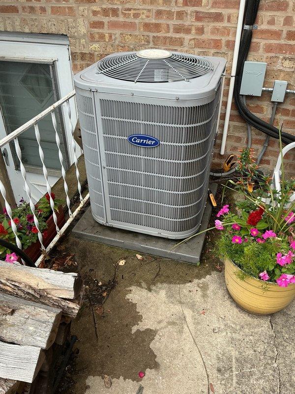Completed spring clean and check maintenance service on residential Carrier air conditioning system per comfort plan agreement. Performed comprehensive inspection of outdoor condenser unit, including cleaning of coils, verification of proper refrigerant levels, electrical connections, and operational testing to ensure optimal system performance for the cooling season.