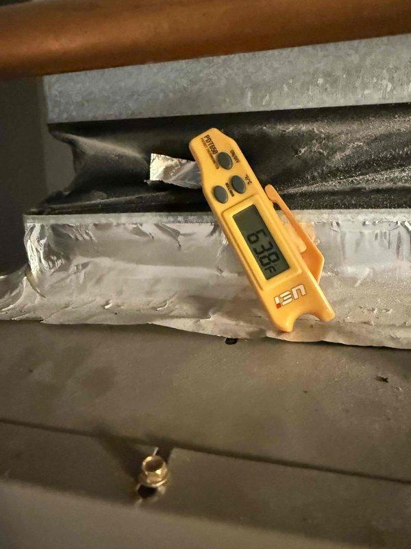 Responded to water leak complaint at air handler following power outage and restoration. Upon inspection, discovered extensive frost buildup on refrigerant lines and evaporator coil assembly, indicating restricted airflow causing coil freeze-up. Found dirty air filter restricting system airflow, which combined with power interruption allowed ice accumulation. Replaced air filter and monitored system temperatures during defrost cycle to confirm proper operation and verify leak was condensation from melting ice rather than drain line issue.