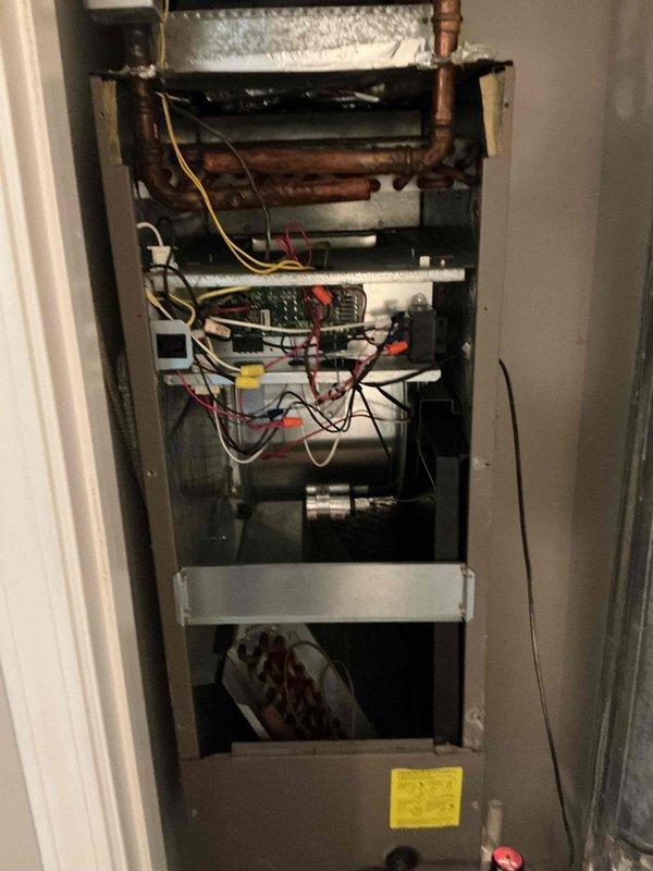 Responded to customer concern regarding unusual noise from AC unit following recent maintenance service. Upon arrival, performed thorough inspection of air handler cabinet and internal components. Examined thermostat operation and confirmed proper temperature display and system communication. Conducted detailed visual assessment of evaporator coil, refrigerant lines, blower assembly, and electrical connections within the air handler. All copper line sets showed proper installation and secure connections. Control board and associated wiring inspected with no loose connections or damaged components identified. Unit cycled through normal operation with no abnormal sounds detected during service visit. System operating within manufacturer specifications at time of inspection.