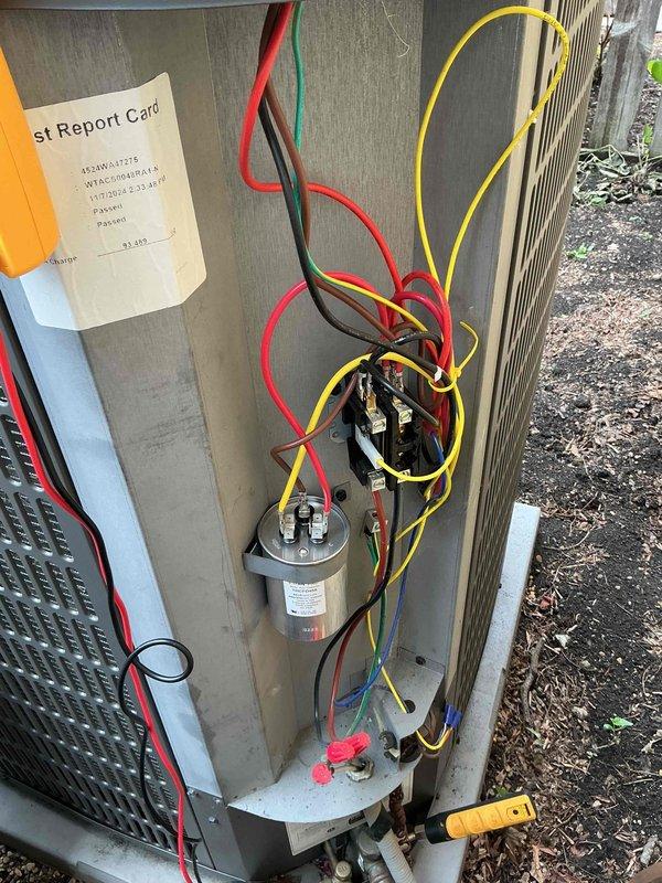 Responded to no cooling complaint on residential air conditioning system. Upon arrival, performed diagnostic testing of outdoor unit electrical components including capacitor voltage readings with multimeter. Evaluated refrigerant charge using digital scale, which indicated system was 10.8 pounds low on refrigerant. Identified leak in system, performed necessary repairs, and recharged unit to manufacturer specifications to restore proper cooling operation.