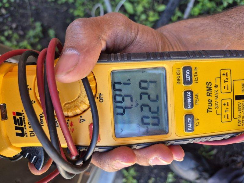 Completed preventative maintenance clean and check on air conditioning system per comfort plan agreement. Performed comprehensive system inspection including internal component evaluation, electrical connections assessment, and operational testing with digital multimeter confirming proper voltage readings at 49.2V. All components found operating within normal parameters with no deficiencies noted.