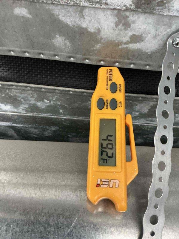 Responded to no cooling complaint at commercial facility. Upon inspection, discovered evaporator coil freezing issue causing system failure. Measured supply air temperature at 42.5°F, confirming restricted airflow and ice buildup on coil. Removed and replaced severely clogged air filter that was restricting airflow and causing coil to freeze. Replaced defective reversing valve assembly due to internal failure affecting refrigerant flow. System restored to normal operation with proper airflow and temperature differential achieved.
