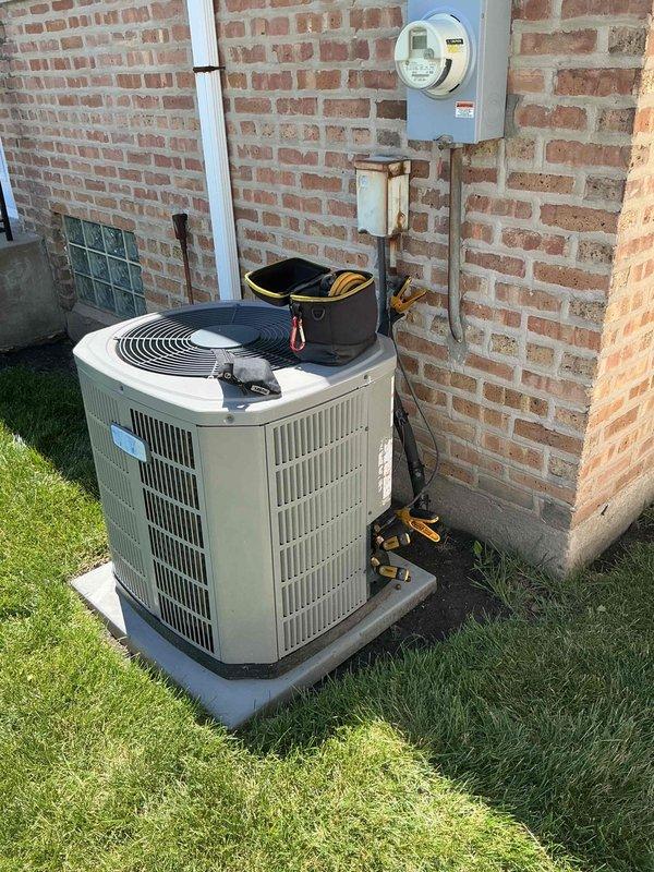 Responded to callback for underperforming cooling system. Thoroughly cleaned outdoor condenser coil to remove accumulated debris, but unit continued to show poor performance. Pressure readings at gauge ports indicated possible restriction at metering piston. System requires follow-up visit to access and inspect piston for debris blockage and complete necessary repairs.