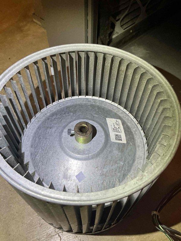 Performed blower wheel cleaning service on HVAC system. Removed squirrel cage fan assembly from unit, which showed significant dust and debris accumulation on blades and internal surfaces. Thoroughly cleaned all blower wheel components, reinstalled assembly, and verified proper operation.