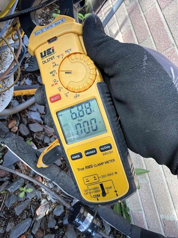 Completed preventative maintenance tune-up on single air conditioning system. Performed electrical diagnostics using clamp meter, recording compressor amp draw of 6.86A and condenser fan motor amp draw of 0.74A, confirming equipment operating within normal parameters. Customer declined comfort plan renewal at time of service.