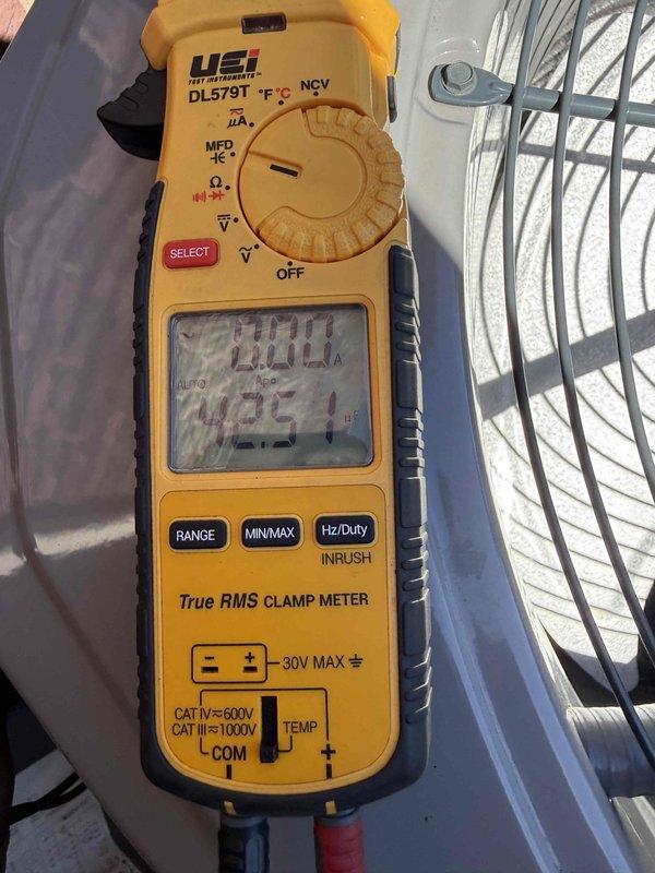 Responded to service call for excessive noise complaint on air conditioning unit. Upon arrival, performed diagnostic testing of condenser fan motor using digital clamp meter to measure electrical draw and verify proper amperage readings. Measurements indicated motor operating within normal parameters at approximately 4 amps and 50 volts. Inspected condenser fan assembly, fan blades, and mounting hardware for potential sources of excessive noise. Documented equipment readings and visual inspection with photographs for warranty records.